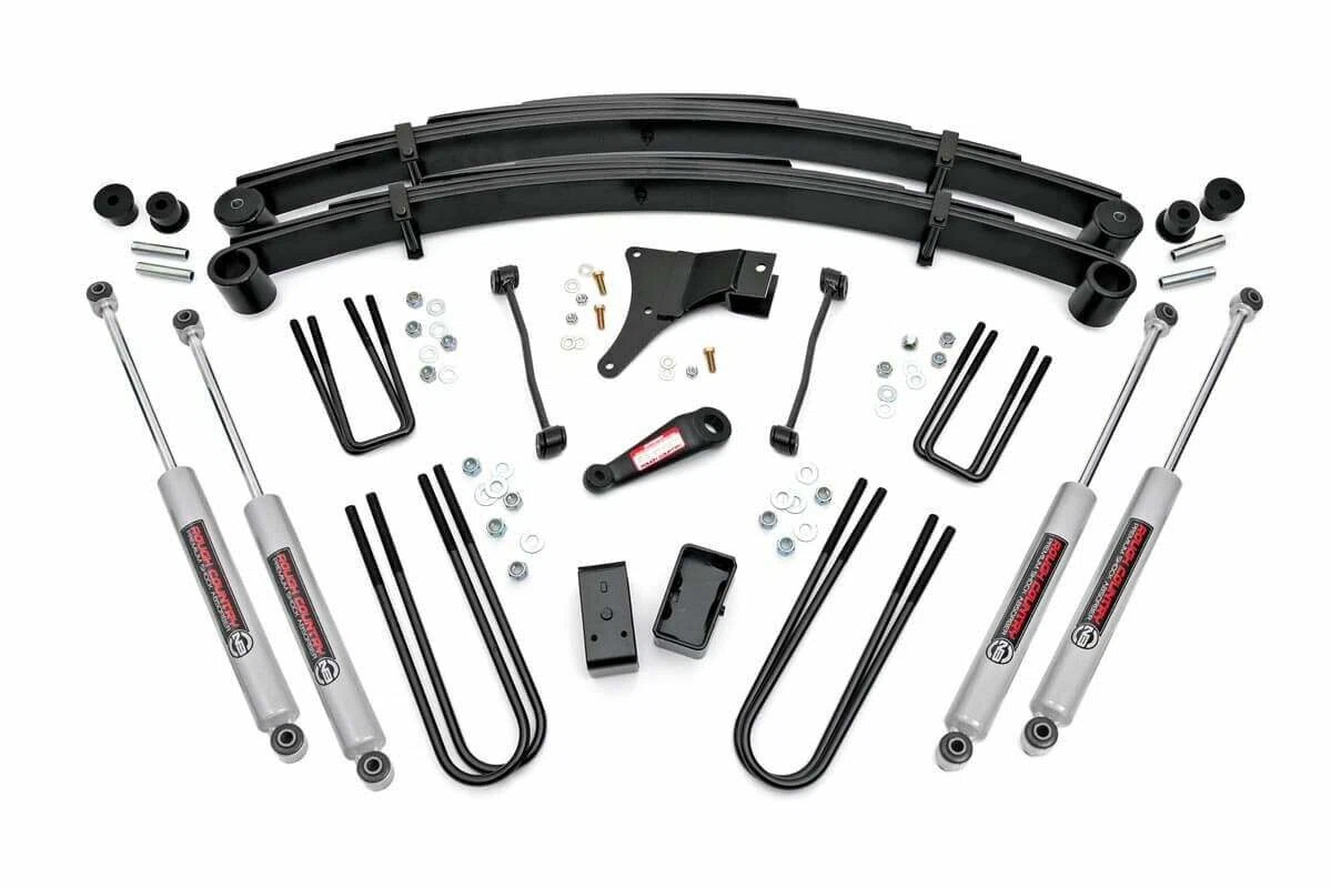 Fits Ford F-250_F-350 Super Duty 4WD (1999) 4 Inch Lift Kit; Rear Blocks; 49430